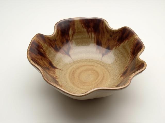 Glazed ceramic decorative bowl with organic edges